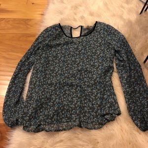 blue and black flowery shirt